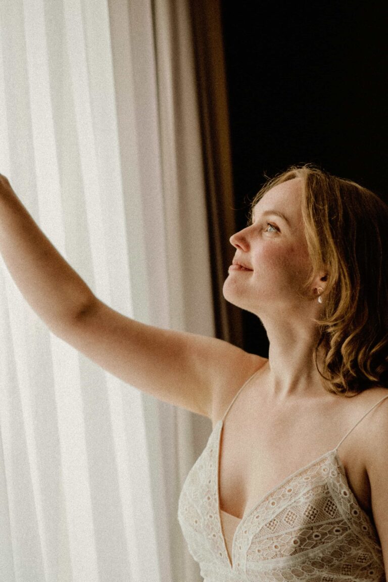 bride in window light in analog film look