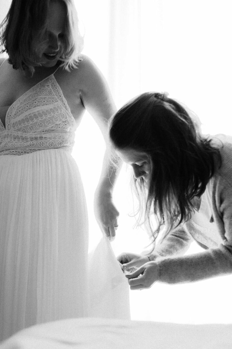 last dress adjustments for bride in vintage black and white