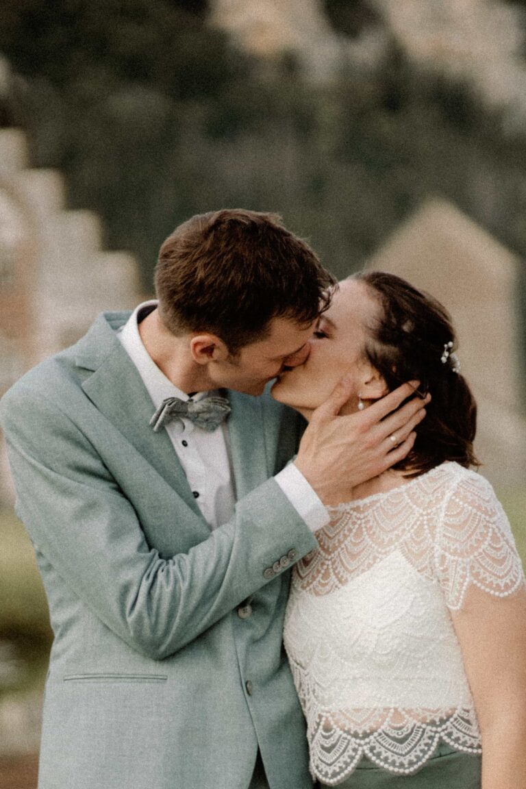 couple kissing in warm analog summer tones