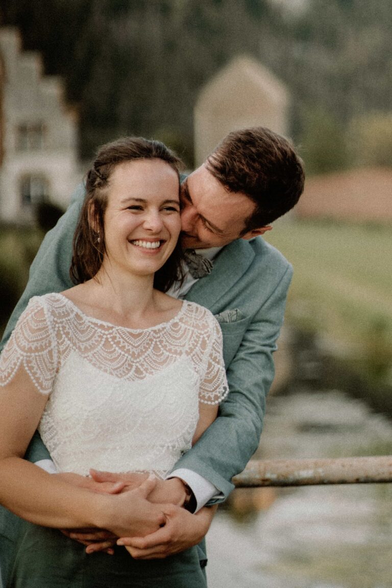 couple looking happy and embracing in vintage film look