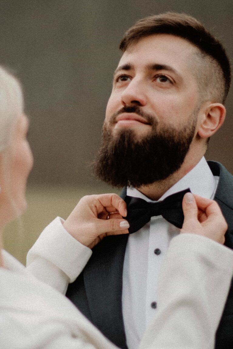 bride correcting bow tie in analog film look