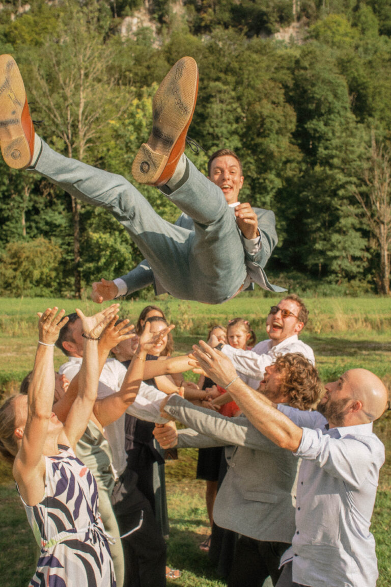 groom flying in the air