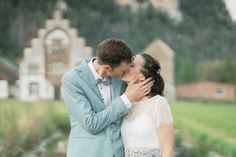 couple kissing in warm analog summer tones