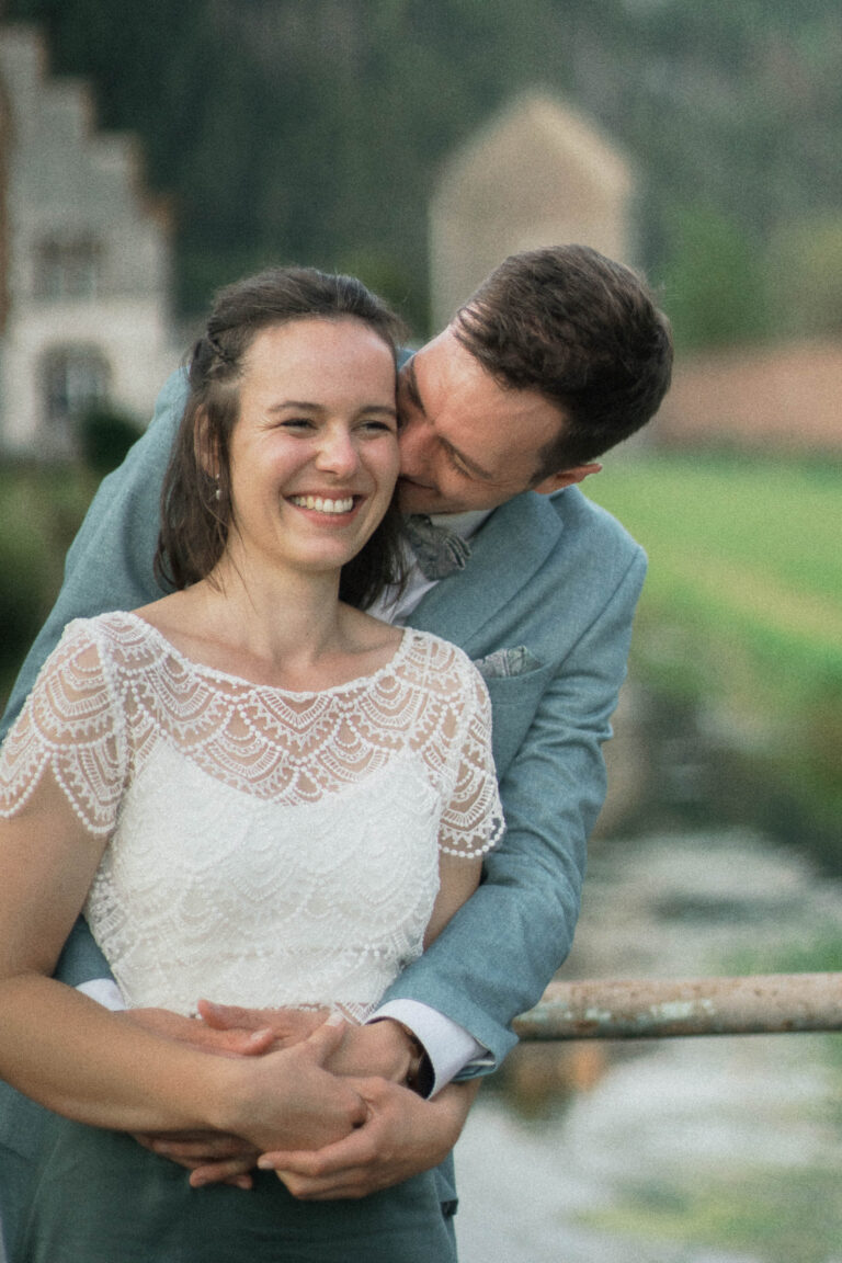 couple looking happy and embracing in vintage film look