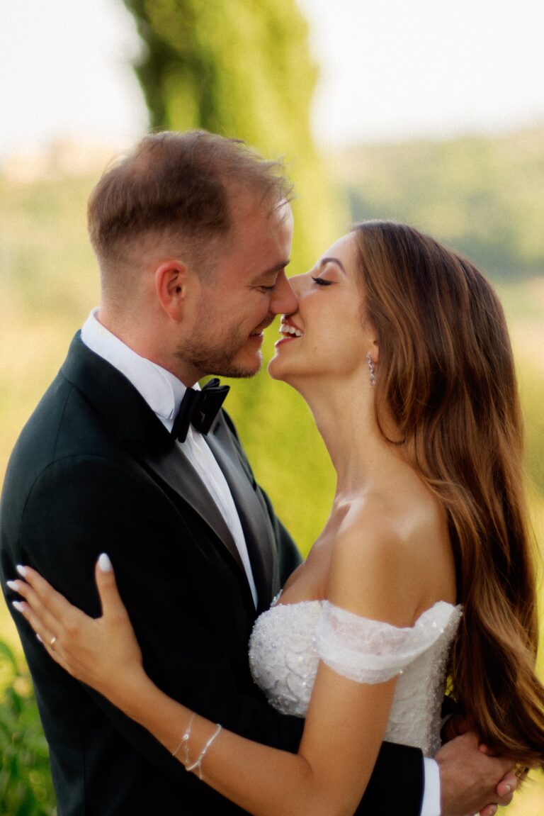 couple kissing in golden hour
